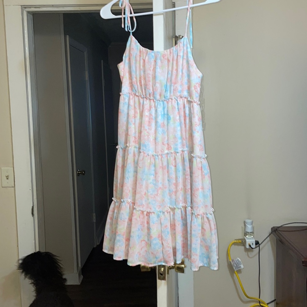 Such an beautiful swim dress with tie shoulders. NWT